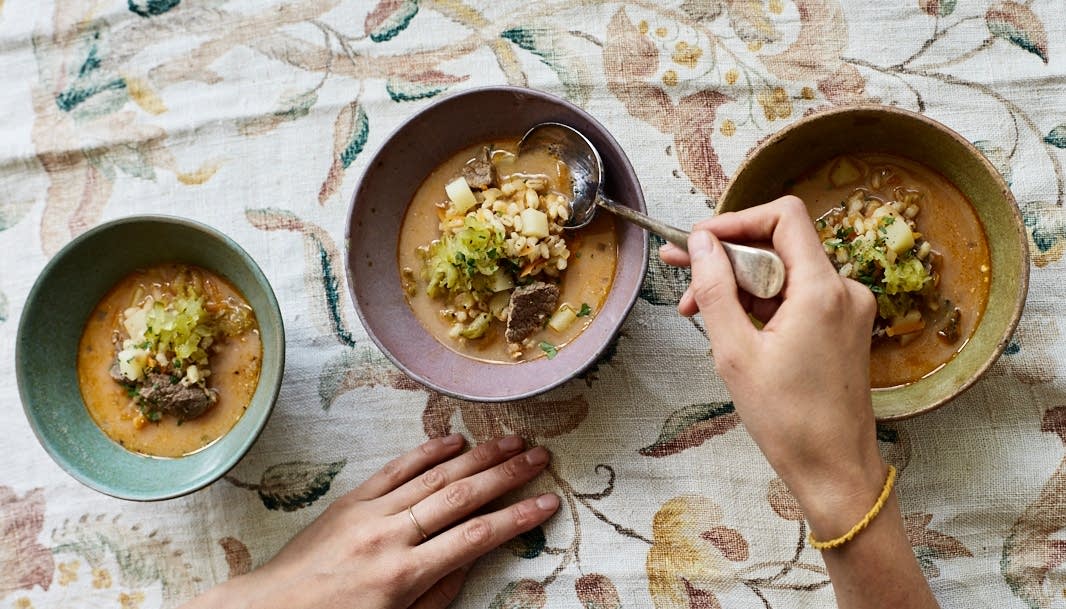 Hearty Rassolnik soup with crusty bread 