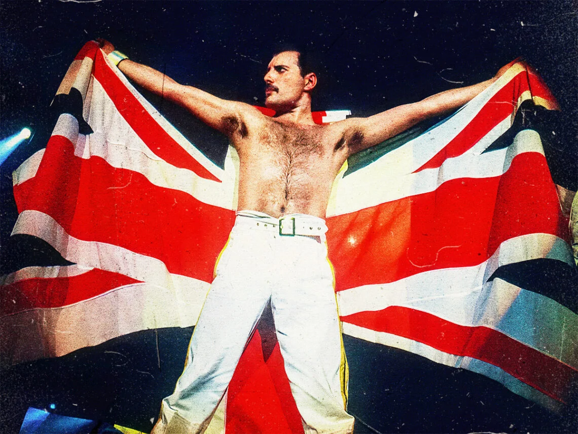 Freddie Mercury performing live in his iconic stage outfit