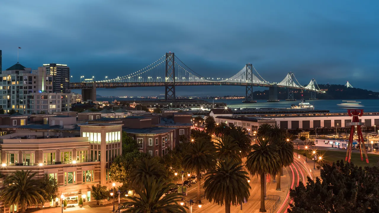 San Francisco's iconic Golden Gate Bridge during a vibrant sunset. 